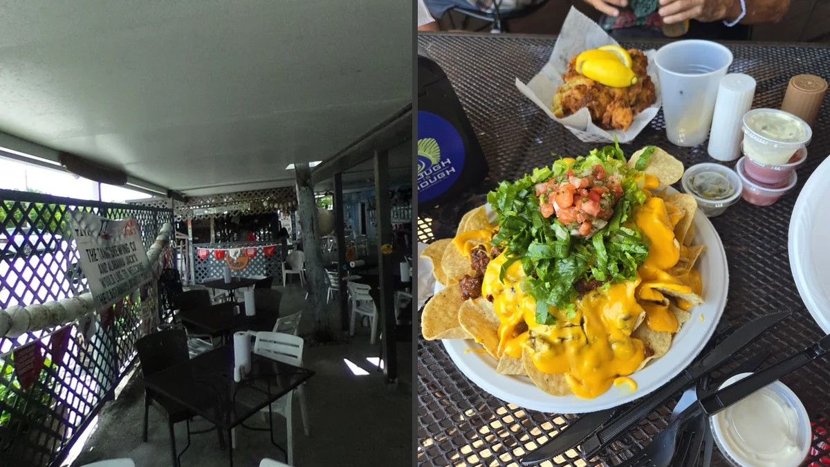 Waterside seafood restaurant with outdoor seating.