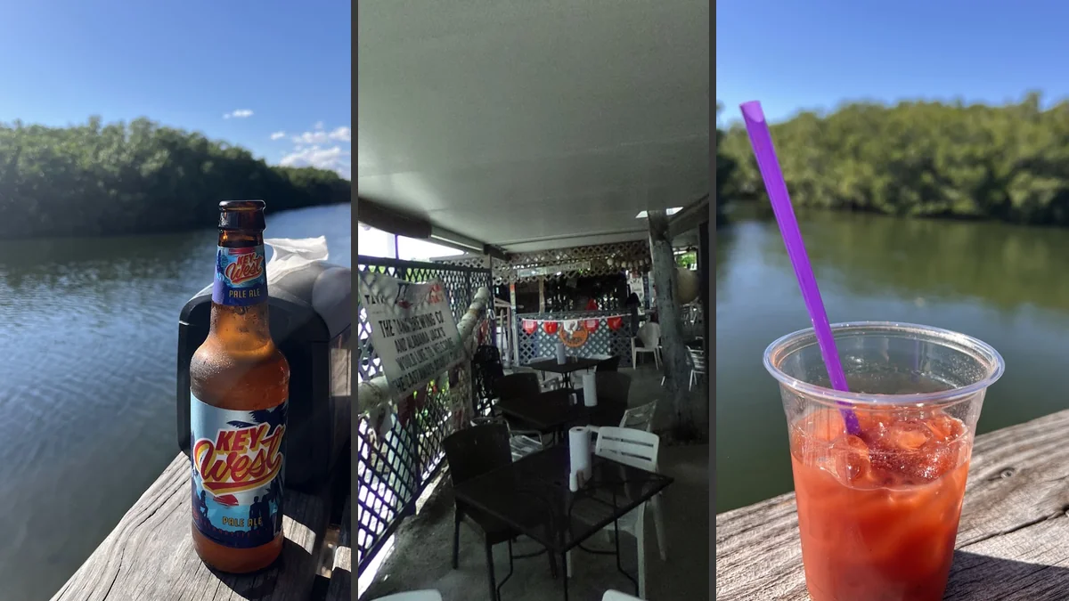 Waterside seafood restaurant with outdoor seating.