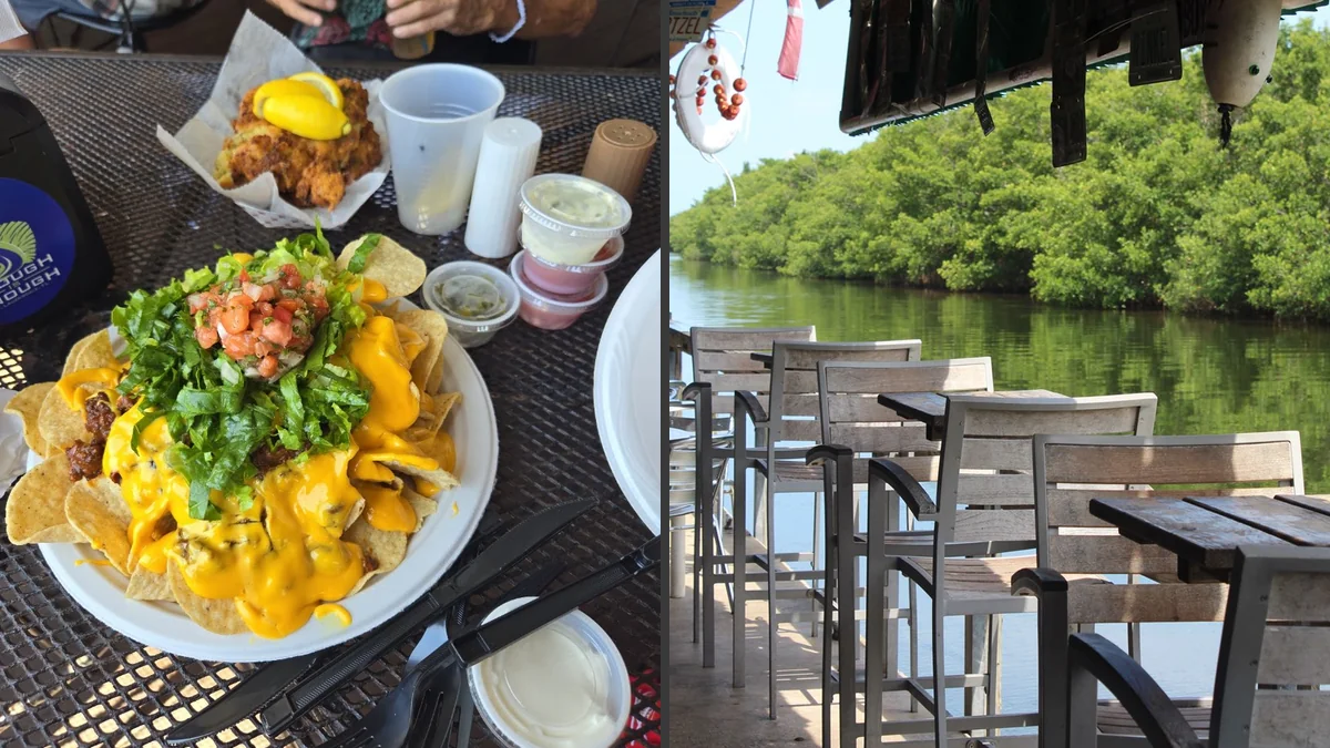 Waterside seafood restaurant with outdoor seating.